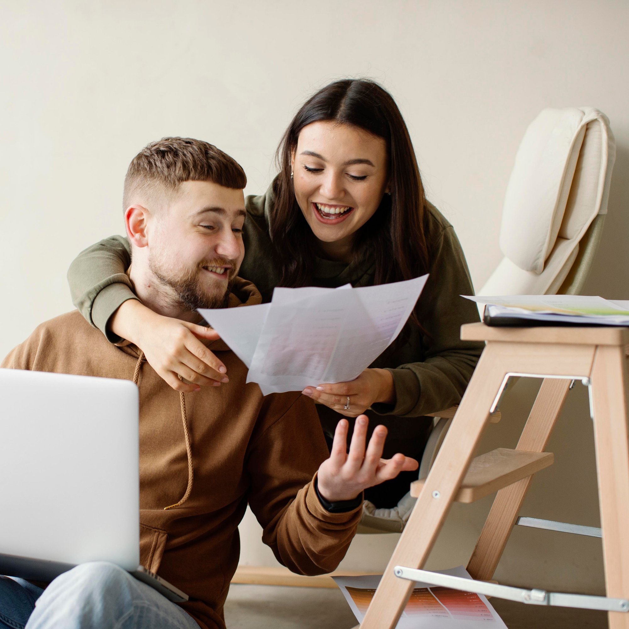 medium-shot-couple-looking-plans